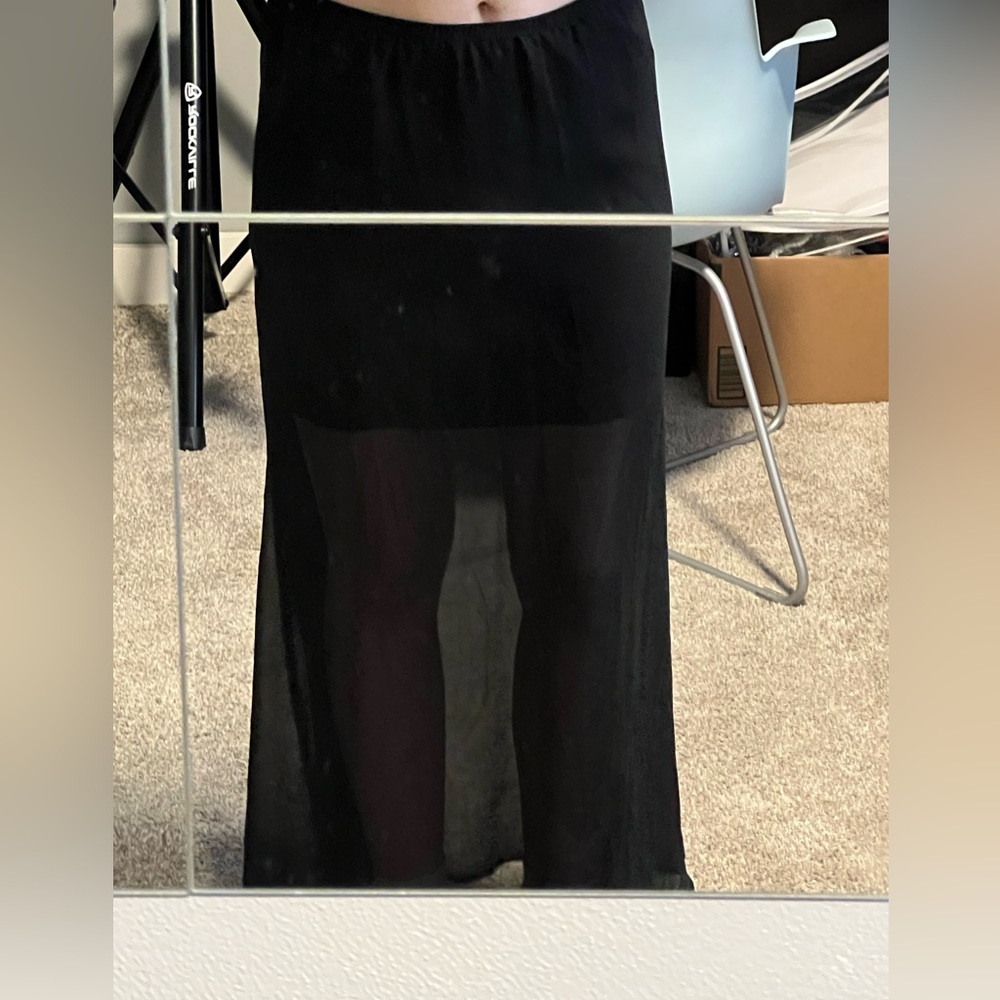 Black Speeckless mesh skirt.